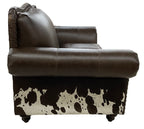 Western leather sofa with Galveston Vintage leather, Rustic Walnut gator-embossed accents, and black & white salt-and-pepper cowhide panels. Luxury ranch sofa.