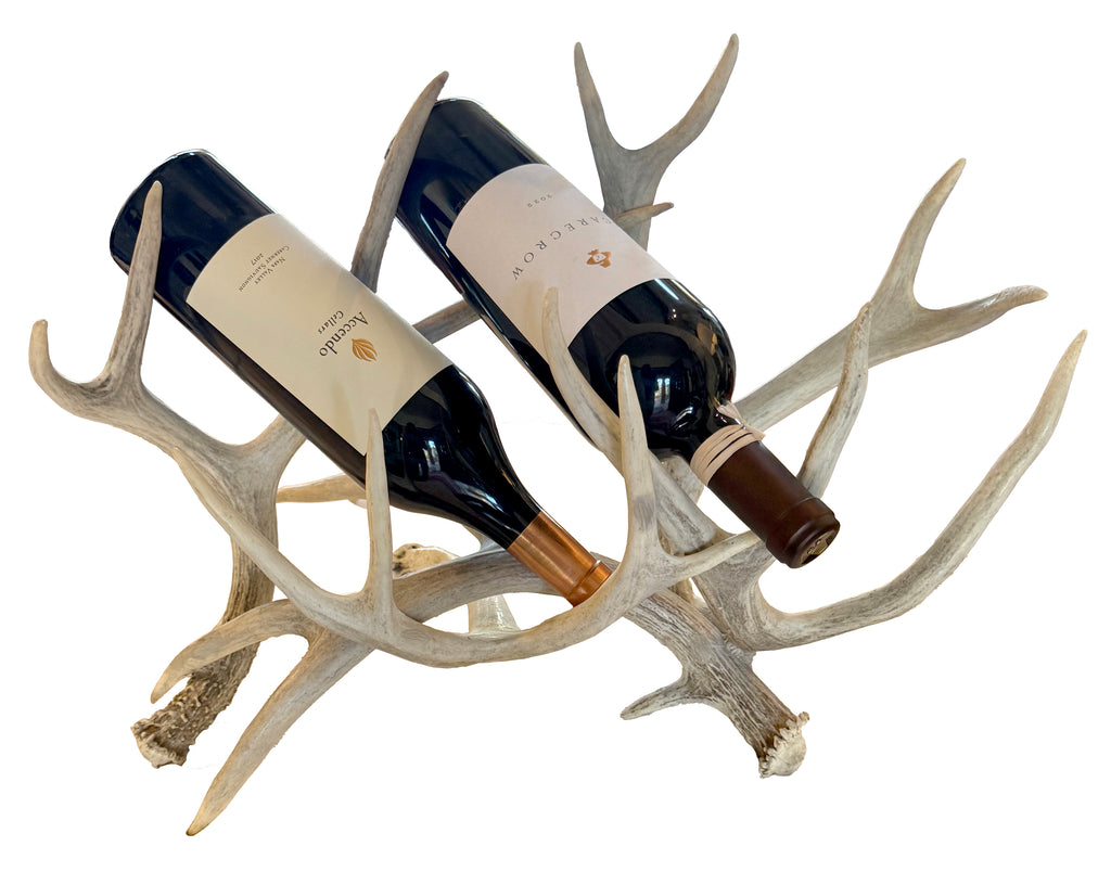 Handcrafted deer antler wine racks for two bottles. Made from naturally shed antlers, each rack is unique—perfect for rustic, Western, or lodge-style home décor.