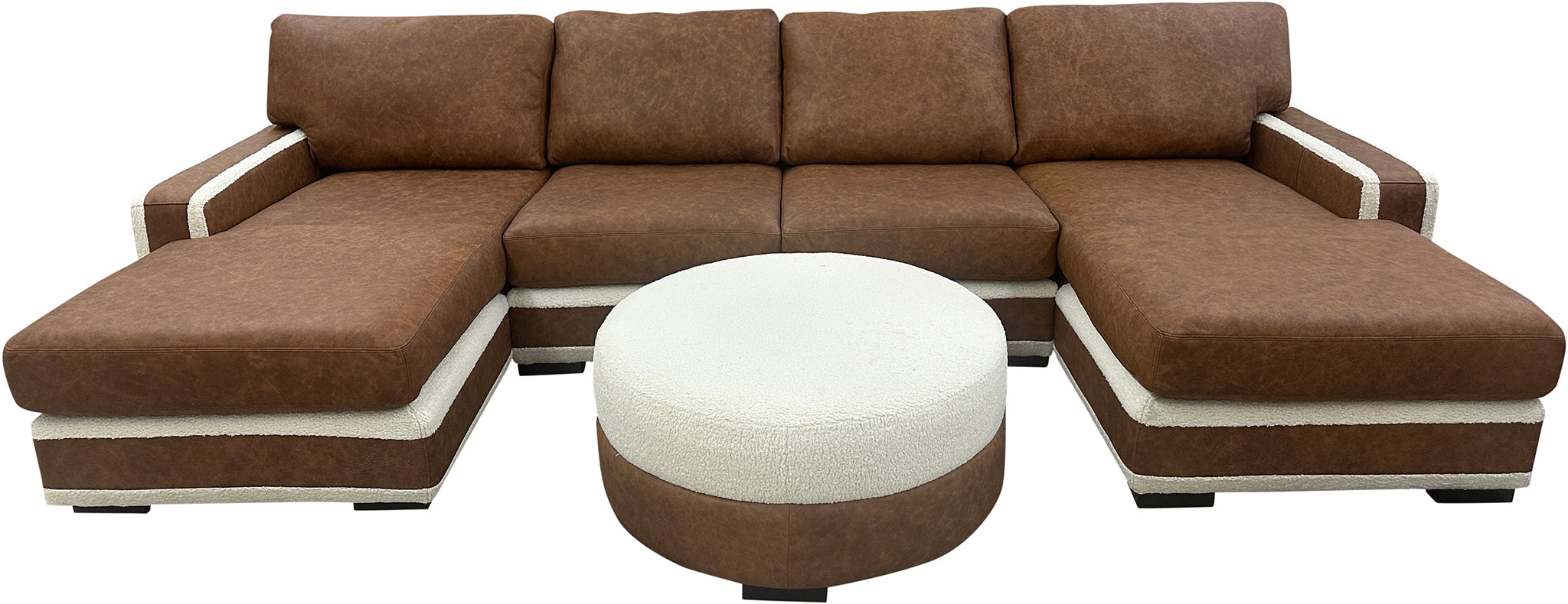 Luxury leather sectional in Dillon Amber with cream Tibetan sheep accents. Deep 27" seats, handcrafted style—perfect for rustic, western, or modern homes.