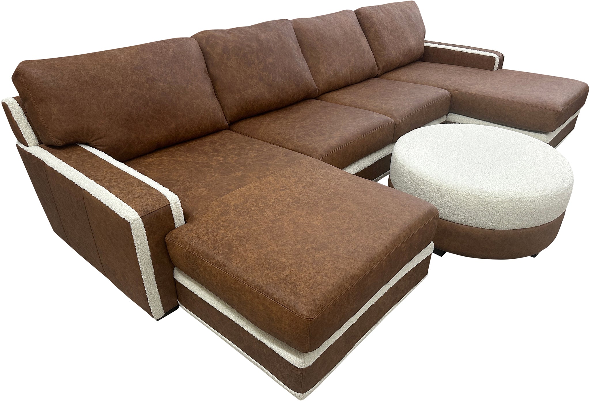 Luxury leather sectional in Dillon Amber with cream Tibetan sheep accents. Deep 27" seats, handcrafted style—perfect for rustic, western, or modern homes.