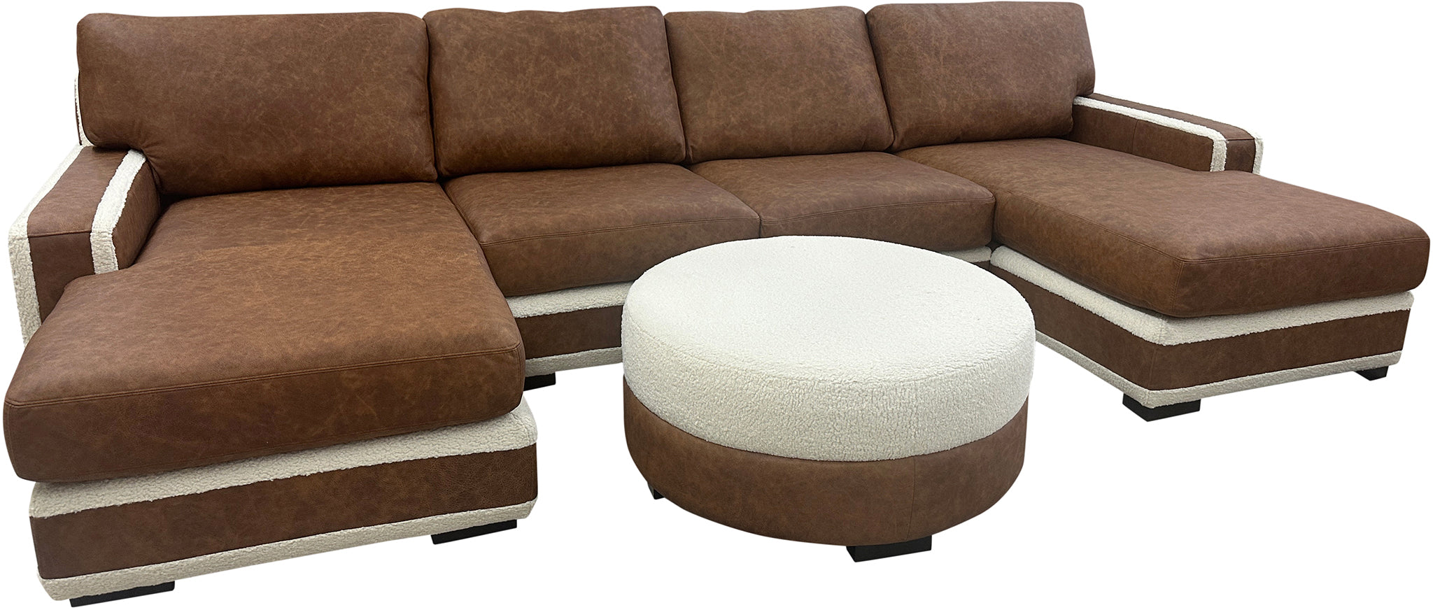 Luxury leather sectional in Dillon Amber with cream Tibetan sheep accents. Deep 27" seats, handcrafted style—perfect for rustic, western, or modern homes.