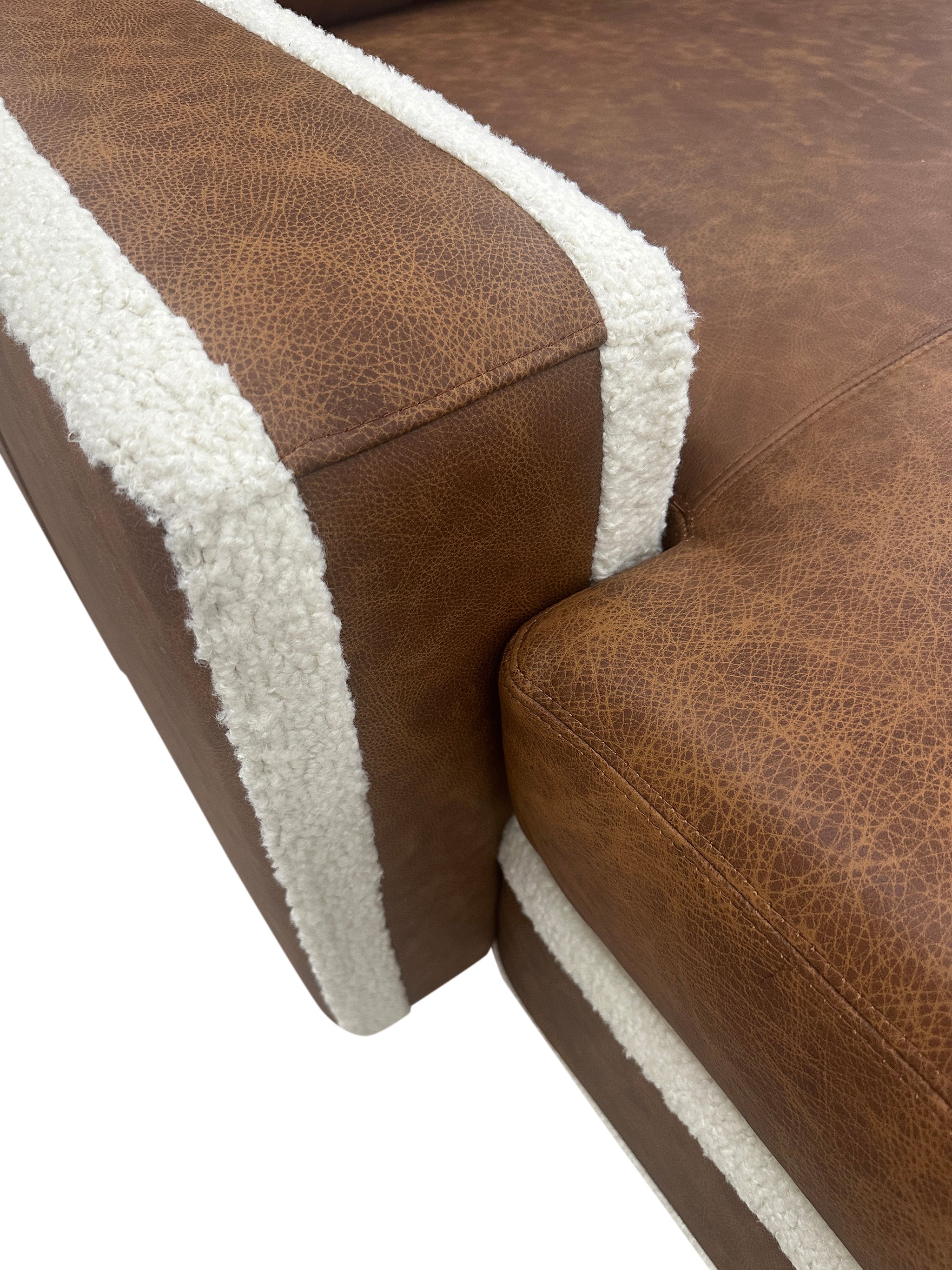 Luxury leather sectional in Dillon Amber with cream Tibetan sheep accents. Deep 27" seats, handcrafted style—perfect for rustic, western, or modern homes.