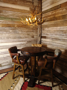 Custom Knotty Alder Pub Table With Antler Chandelier and Western Farmhouse Leather and Cowhide Barstools