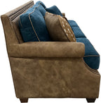 Luxury Western sofa with Stallone Branch leather frame, Devotion Denim fabric cushions, and Axis hide accents. Nailhead trim designer ranch and lodge sofa.