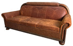 Brown leather sofa on a white background
