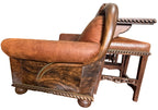 Brown leather armchair with intricate detailing on a white background