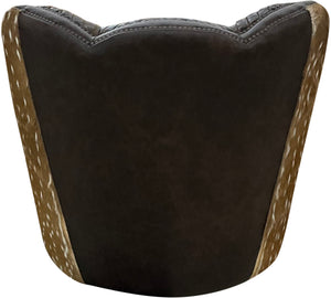 Brown leather swivel chair with quilted diamond tufted pattern and authentic axis deer hide wrapped around the outside arms