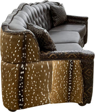 Load image into Gallery viewer, curved tufted conversation western brown leather sofa with del rio brown accent leather and authentic axis hide on the outside wings and arms