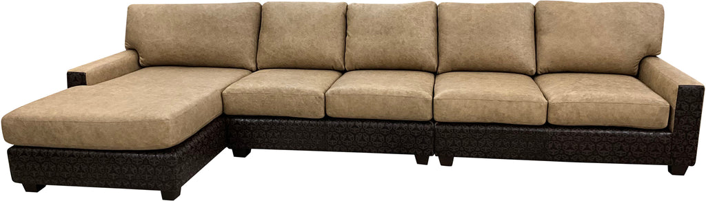 The Landman Sectional features Landman Oatmeal leather with Lindt Mocha accents, offering a spacious layout with a chaise and versatile seating. Stylish, durable, and perfect for modern or Western-inspired interiors.