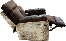 Load image into Gallery viewer, Relax in Western style with the Dakota Rocker Recliner, crafted in Cora Pecan leather, Del Rio Brown accents, and light exotic brindle hide. Features oversized metal cup holders built to fit YETI tumblers.