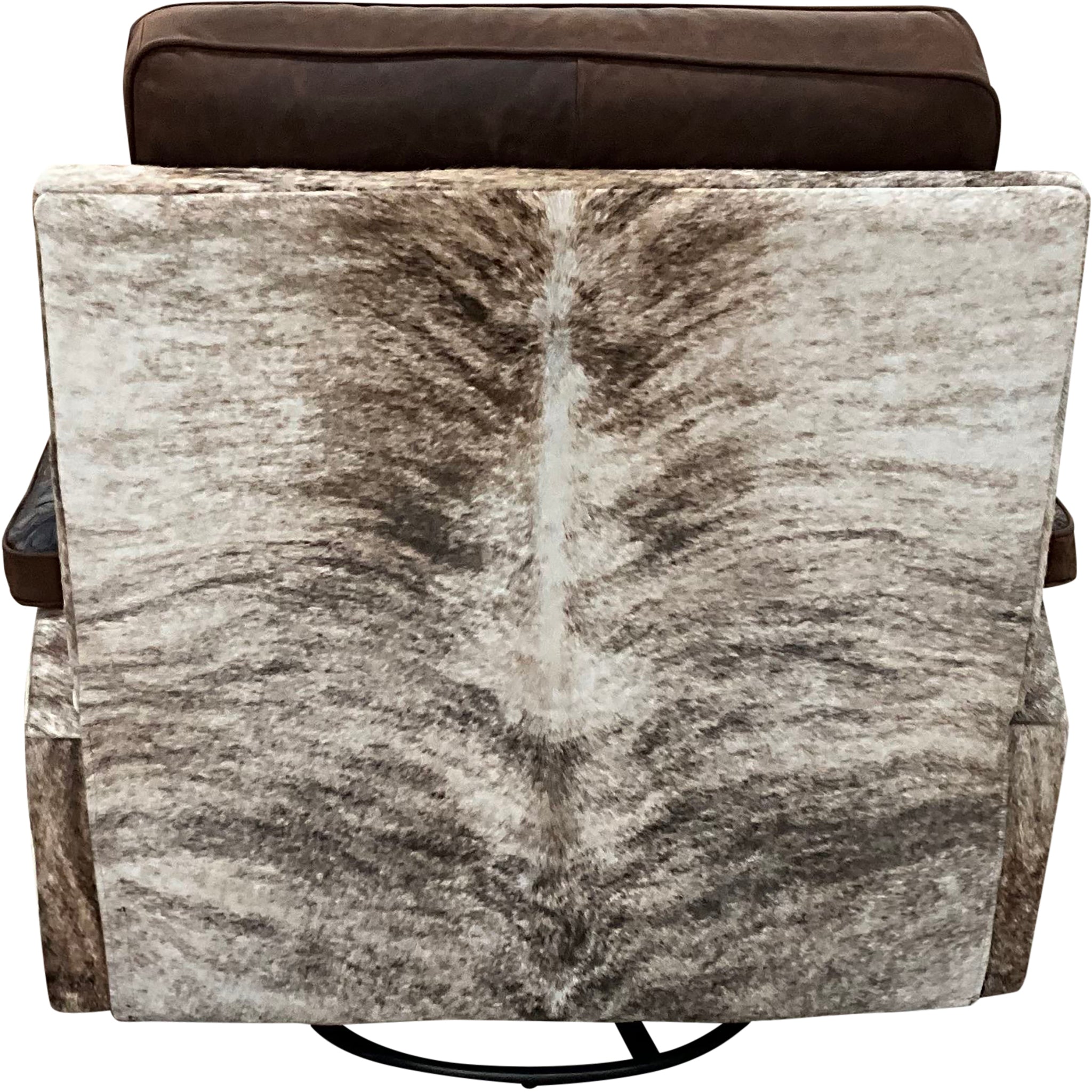 Relax in Western style with the Dakota Rocker Recliner, crafted in Cora Pecan leather, Del Rio Brown accents, and light exotic brindle hide. Features oversized metal cup holders built to fit YETI tumblers.