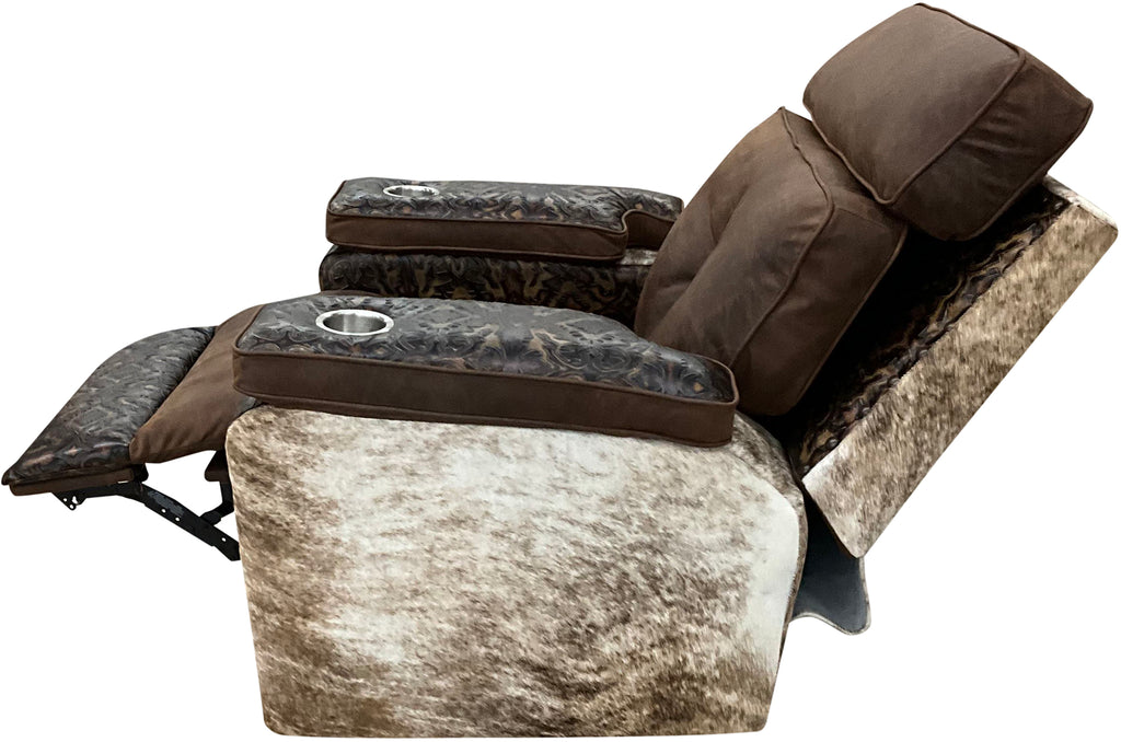 Relax in Western style with the Dakota Rocker Recliner, crafted in Cora Pecan leather, Del Rio Brown accents, and light exotic brindle hide. Features oversized metal cup holders built to fit YETI tumblers.