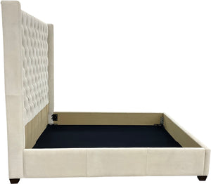 Madison Tufted Bed with wingback headboard in cream Satin Suede leather. Modern silhouette, traditional tufting—custom sizes available.