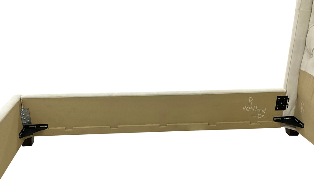 Madison Tufted Bed with wingback headboard in cream Satin Suede leather. Modern silhouette, traditional tufting—custom sizes available.