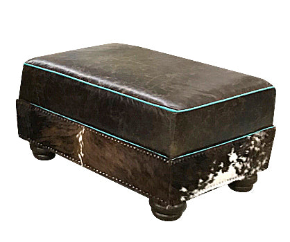 Great Blue Heron's Salado Medium Ottoman 34" x 24" is upholstered using our distressed Buffalo leather and accented with tri color cowhide and turquoise welt