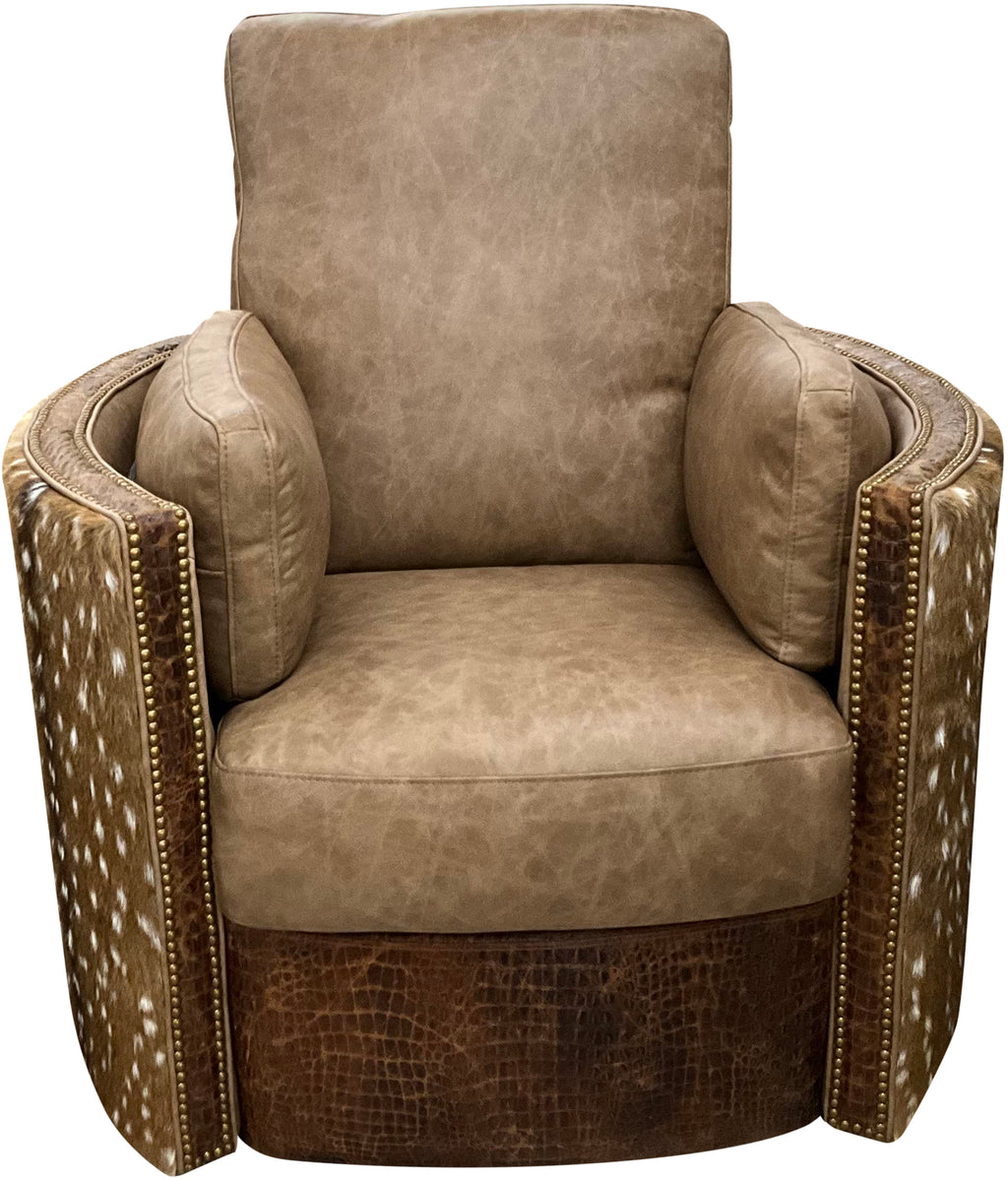 A swivel recliner chair with a brown and beige palio camel base leather, rustic cognac leather on the arms and a hide-covered headrest.