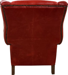 The Paloma Wingback Recliner pairs full-grain crimson leather with handcrafted wood details and a smooth reclining design. A bold expression of Western sophistication — built for beauty, comfort, and lasting craftsmanship.