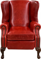 The Paloma Wingback Recliner pairs full-grain crimson leather with handcrafted wood details and a smooth reclining design. A bold expression of Western sophistication — built for beauty, comfort, and lasting craftsmanship.