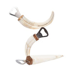 Handcrafted bottle openers made from real warthog tusks and springbok horns. Unique, rustic bar accessories combining natural materials and sturdy metal construction—perfect for collectors and Western-inspired home bars.