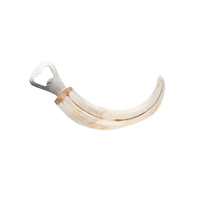 Load image into Gallery viewer, Handcrafted bottle openers made from real warthog tusks and springbok horns. Unique, rustic bar accessories combining natural materials and sturdy metal construction—perfect for collectors and Western-inspired home bars.