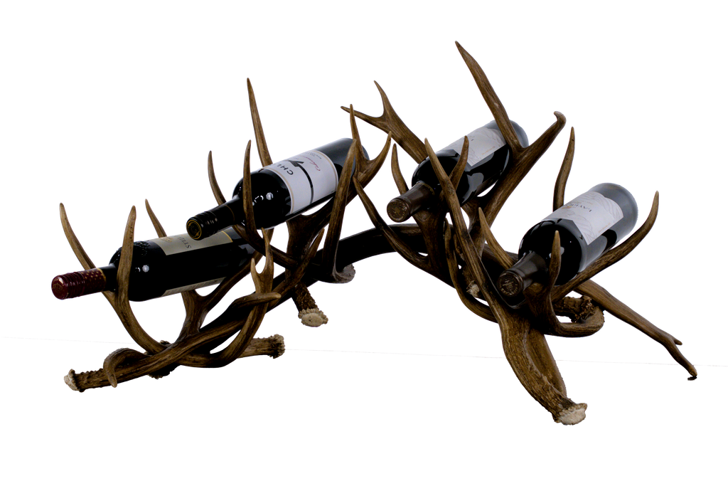 Handcrafted deer antler wine racks for  four bottles. Made from naturally shed antlers, each rack is unique—perfect for rustic, Western, or lodge-style home décor.