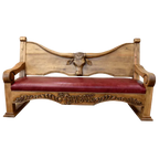 Handcrafted Western bench with longhorn carving, red leather seat, and “Cowboys” inscription. The Cowboy Bench combines rustic artistry with bold, personalized craftsmanship.