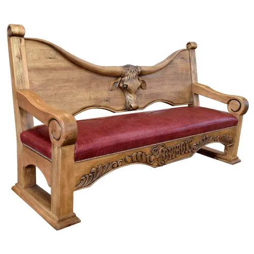 Handcrafted Western bench with longhorn carving, red leather seat, and “Cowboys” inscription. The Cowboy Bench combines rustic artistry with bold, personalized craftsmanship.
