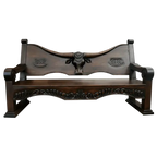 Handcrafted Western bench with longhorn carving, ranch brands, and dark finish. The Cowboy 2 Bench blends rustic strength and refined artistry in a customizable heirloom design.