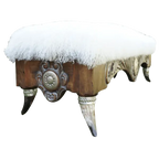 Handcrafted Western bench with Tibetan wool upholstery, silver-finished carvings, and copper conchos. The Santa Petronilla II Bench blends rustic elegance and artisanal craftsmanship in a truly unique design.