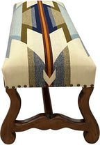 Western Trails Bench by Great Blue Heron Furniture features a hand-carved wood frame and a Pendleton style wool blanket upholstery, blending refined Western luxury with heirloom craftsmanship.