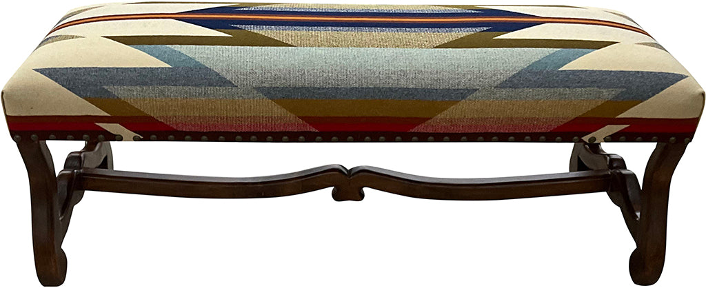 Western Trails Bench by Great Blue Heron Furniture features a hand-carved wood frame and a Pendleton style wool blanket upholstery, blending refined Western luxury with heirloom craftsmanship.