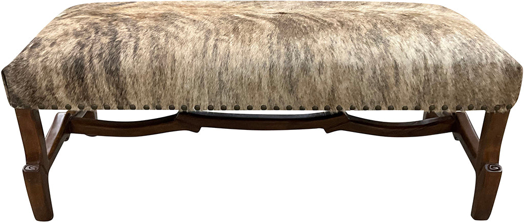 Handcrafted cowhide bench with light exotic hide and hand-carved twig-style wood base. A luxury Western accent bench made in Texas by Great Blue Heron Furniture.