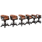 The Rocca La Elegante 2 Barstool features rich brown leather, hand-carved wood, and forged iron details. With a tufted back, 180° swivel, and bold Western style, it’s elegance with rugged sophistication.