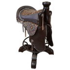 The Chaps Saddle Barstool features full-grain leather, embossed Western patterns, copper conchos, and a 180° swivel wooden base. A handcrafted Western saddle barstool that celebrates cowboy craftsmanship and the artistry of the American frontier.