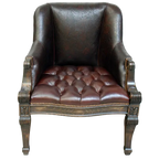 The La Antigua Chair combines full-grain leathers, tufted seating, and hand-carved wood details with a cowhide back. Elegant, durable, and 100% customizable — a striking blend of Western artistry and timeless comfort.