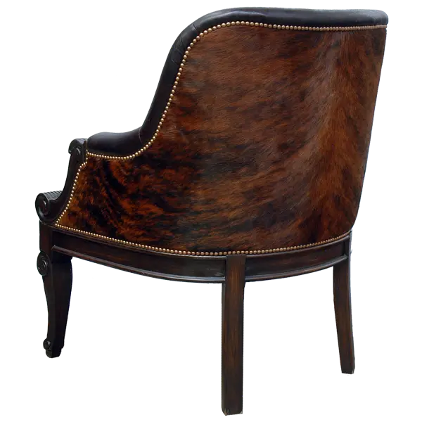The La Antigua Chair combines full-grain leathers, tufted seating, and hand-carved wood details with a cowhide back. Elegant, durable, and 100% customizable — a striking blend of Western artistry and timeless comfort.