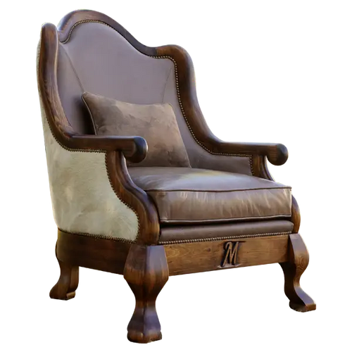 The Brand 12 Chair is a handcrafted Western heirloom featuring your custom hand-carved logo or brand, rich full-grain leather, and cowhide upholstery. Built to last for generations — a personalized statement of luxury and legacy.