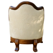Load image into Gallery viewer, The Brand 12 Chair is a handcrafted Western heirloom featuring your custom hand-carved logo or brand, rich full-grain leather, and cowhide upholstery. Built to last for generations — a personalized statement of luxury and legacy.