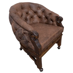 The Elegante Poker 16 Chair combines deep-tufted full-grain leather, hand-carved wood, and rolling casters for luxury and comfort. A timeless handcrafted Western chair, customizable to your taste and built for lasting sophistication.