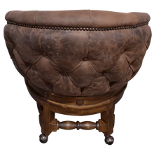 Load image into Gallery viewer, The Elegante Poker 16 Chair combines deep-tufted full-grain leather, hand-carved wood, and rolling casters for luxury and comfort. A timeless handcrafted Western chair, customizable to your taste and built for lasting sophistication.
