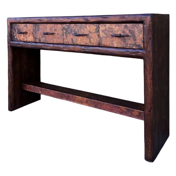 Copper console table with three drawers on a white background