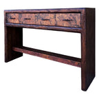 Copper console table with three drawers on a white background
