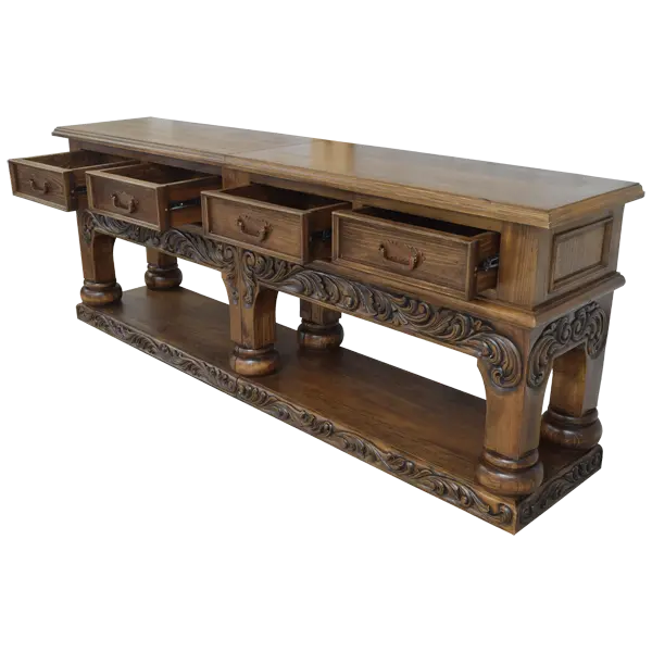 Handcrafted Spanish colonial console with baroque floral scroll carvings, forged iron handles, 4 drawers, platform base & antique finish. Customize your luxury Western décor piece.