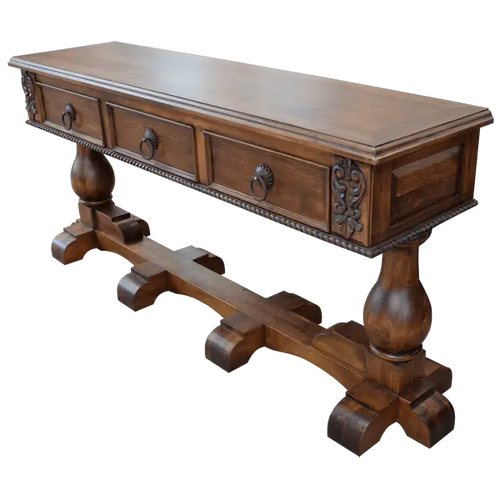 Handcrafted Spanish colonial console with carved scrollwork, twist rope details, forged iron pulls, turned pedestals, and customizable solid wood construction.