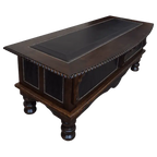 Handcrafted executive desk with crocodile-embossed leather panels, twisted rope molding, and solid wood base. The Puro Rancho Desk embodies Western luxury and artisanal craftsmanship.