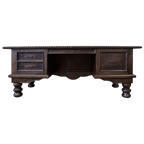 Handcrafted executive desk with crocodile-embossed leather panels, twisted rope molding, and solid wood base. The Puro Rancho Desk embodies Western luxury and artisanal craftsmanship.