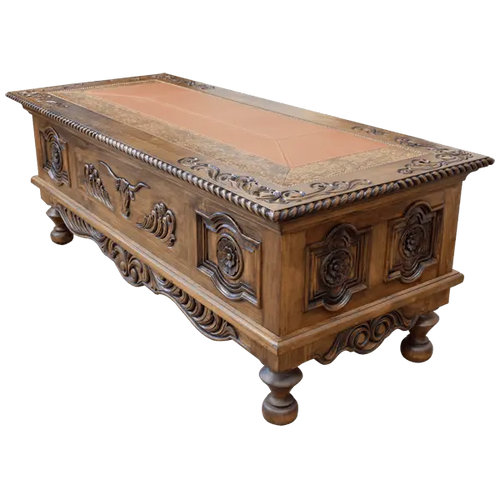 Hand-carved Western executive desk with longhorn motif, tooled leather inlay, and twisted rope detail. The San Benito Desk blends craftsmanship, heritage, and refined Western design.