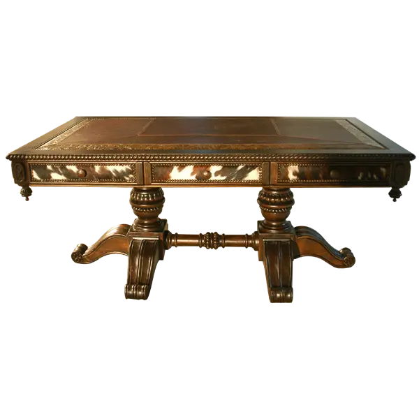 Handcrafted Western executive desk featuring cowhide panels, leather inlay, and hand-carved pedestal base. The Castellano 2 Desk unites bold Western style with refined craftsmanship.