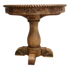 Handcrafted half-round table with carved floral apron, twist-rope edge, and pedestal base. The San Felipe Half-Round Table blends elegance, versatility, and artisan woodworking.