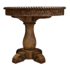 Handcrafted half-round table with carved floral apron, twist-rope edge, and pedestal base. The San Felipe Half-Round Table blends elegance, versatility, and artisan woodworking.